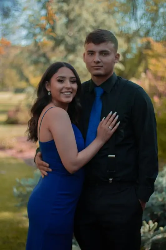 Couple posing outdoors