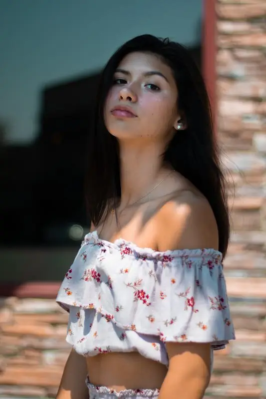 Woman in a floral off-shoulder top