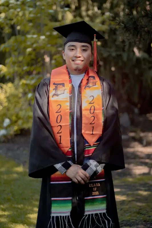 Graduate in cap and gown, class of 2021