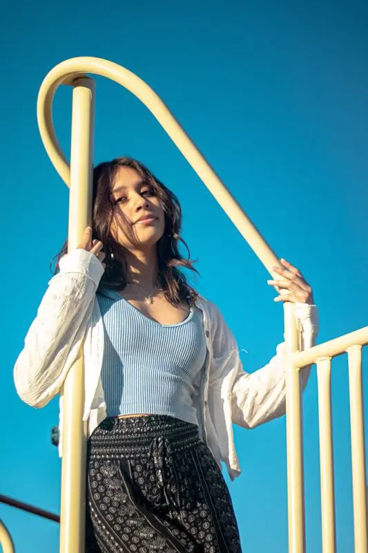 Young woman on a playground structure