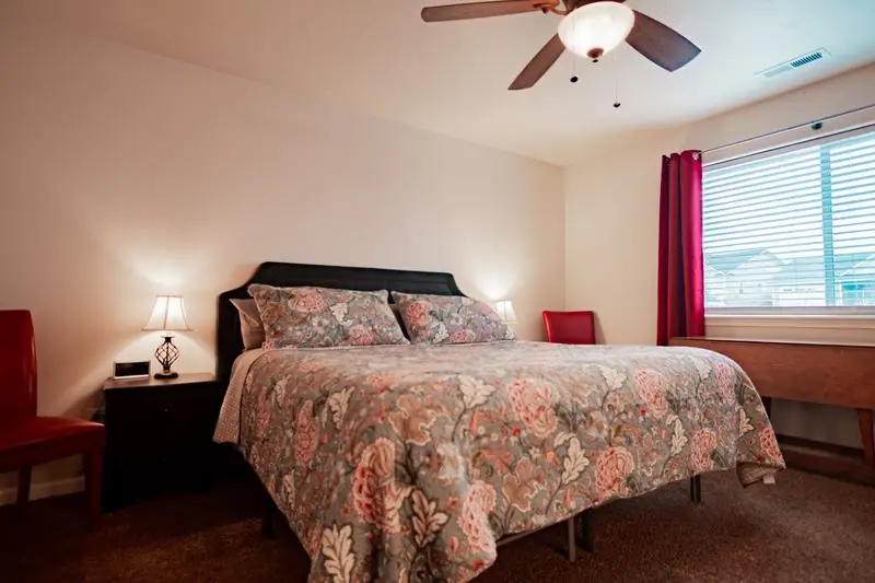 Bedroom with a floral bedspread
