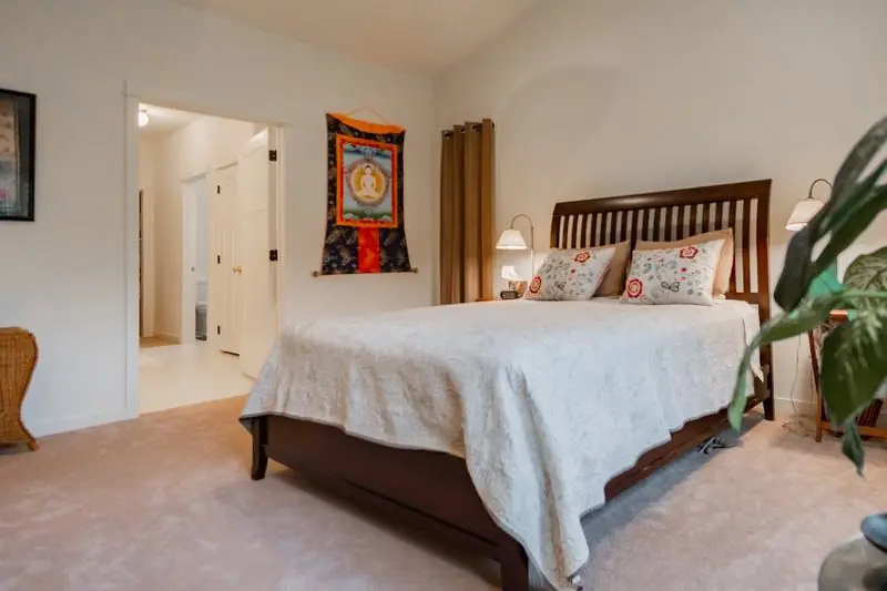 Cozy bedroom with a wooden bed frame