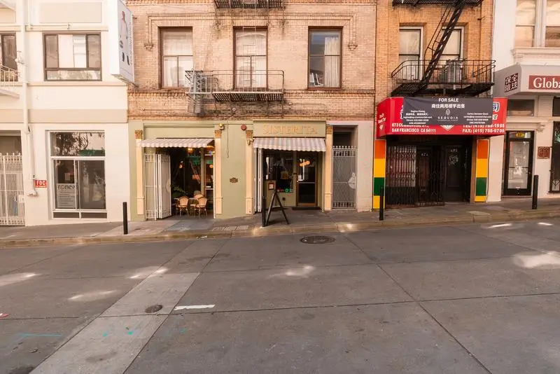 Storefront with a striped awning