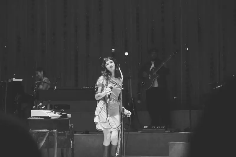 Black and white woman singing